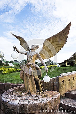 Kinnaree angel statue and lighting at Sirindhorn wararam phu prao temple or Wat phu prao Stock Photo