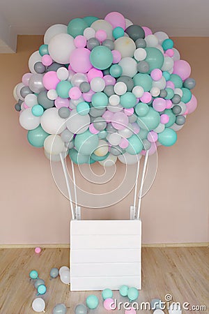Decoration for the photo zone and holiday balloon made of pink, gray, white and mint balloons Stock Photo