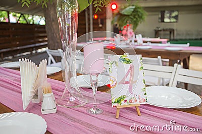 Decoration for a wedding ceremony on a back yard with tables, pl Stock Photo