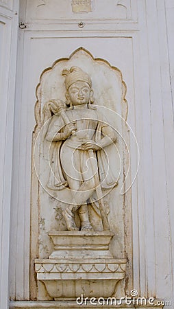 Decorative adornment on a wall from a stone Stock Photo