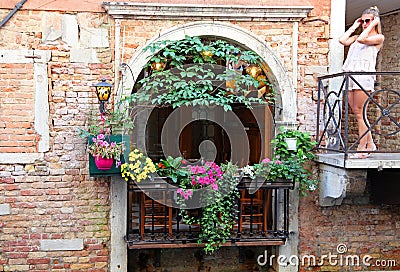 Decorative arched window in Venice Editorial Stock Photo