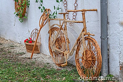 Decorative bike made from twigs and wicker Stock Photo