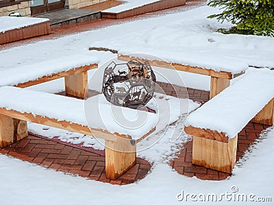 Sochi, Russia - 25 February 2020. Decorative carved brazier in the shape of a soccer ball with animal figures with Editorial Stock Photo