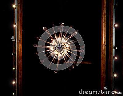 Decorative chandelier made of glass rods. Artistic object Stock Photo