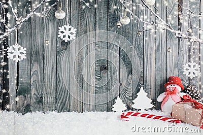 Decorative Christmas Background Composed of a Snowman, a Giant Candy Stick and Various Gifts Stock Photo