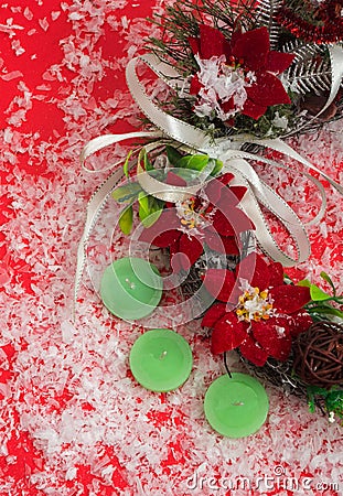 Decorative Christmas wreath with flowers poinsettia. Stock Photo