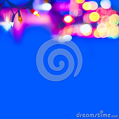 Decorative Colorful Blurred Christmas Lights On Blue Background. Abstract Soft Lights. Colorful Bright Circles Of A Sparkling Garl Stock Photo