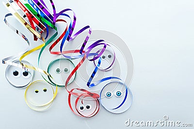 Decorative Colorful holiday tapes in reels on white silver background. Concept Gift Packaging, holiday birthday Stock Photo