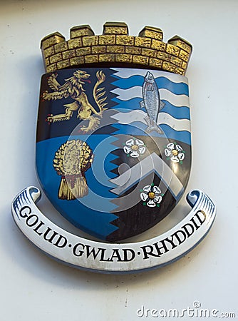 Decorative colourful Welsh heraldic symbol on wall Editorial Stock Photo