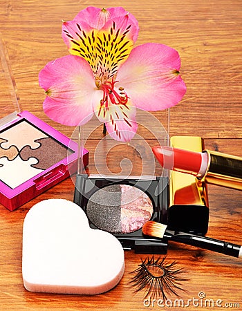 Decorative cosmetics and orchid flower Stock Photo