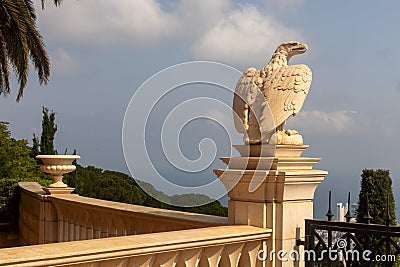 A decorative eagle statue is in the Bahai Garden, located on Mount Carmel in the city of Haifa, Editorial Stock Photo