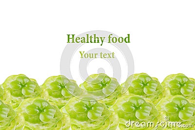 Decorative edging of the piles of green pepper on a white background. Stock Photo