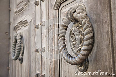 Decorative element of the city`s massive metal gate Stock Photo