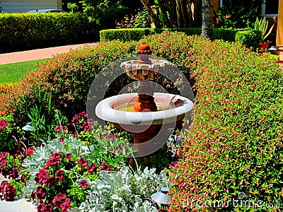 Decorative fountain in front of a luxury home Stock Photo