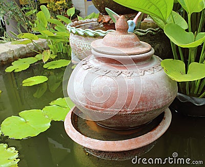 Decorative garden with terracotta pots Stock Photo