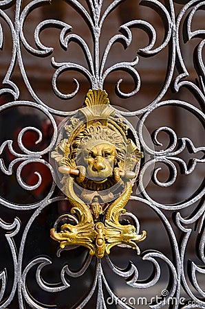 Decorative gilded lion head golden knob, Venice Stock Photo