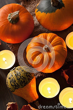 Decorative halloween pumpkins and candles Stock Photo