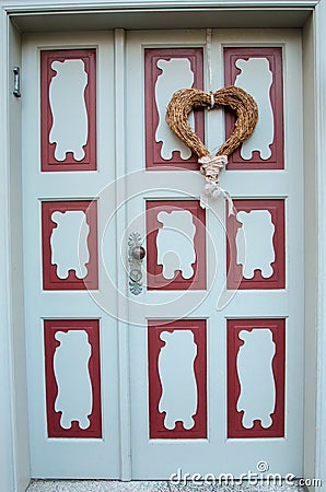 Decorative heart on the front door love, Valentine`s Day, Febru Stock Photo