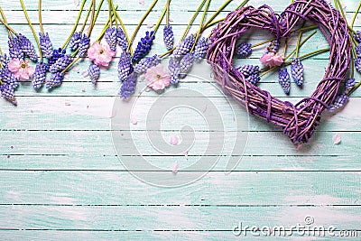 Decorative heart and spring flowers. Stock Photo