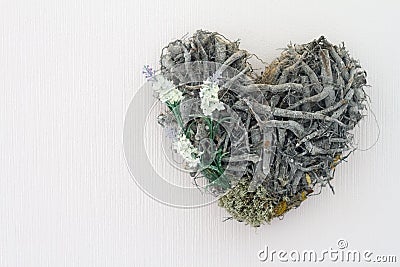 Decorative heart on a wooden background. Stock Photo