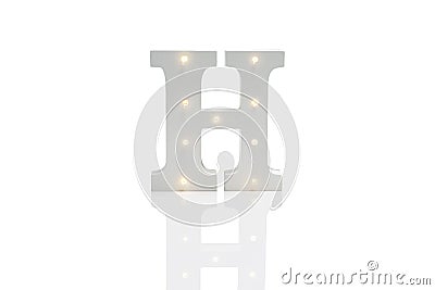 Decorative Letter H with Embedded LED Lights Over White Background Stock Photo