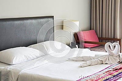 Decorative luxury double bed in hotel Stock Photo