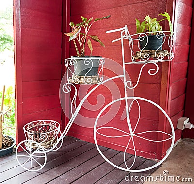 Decorative metal bicycle painted white Stock Photo