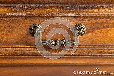 Decorative metal ornate drawer handle Stock Photo