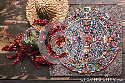 decorative mexican symbol board near dried chili sombrero. High quality photo Stock Photo