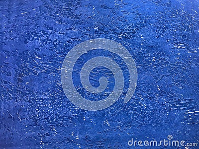 Decorative navy blue plaster in vintage style. Texture of azure stone background, closeup Stock Photo