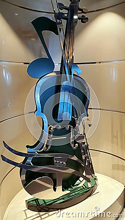 Decorative object in the shape of a violin, inside luxurious cruise ship MSC Grandiosa Editorial Stock Photo