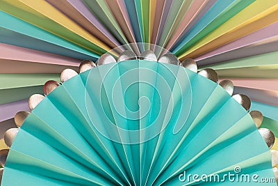 Decorative Paper Rosettes. Circle Shaped Folded Paper. Paper Fan Decorations Stock Photo