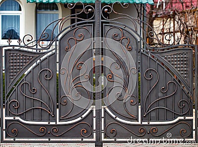 Decorative parts of metal gates, elements of hand forging Stock Photo