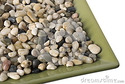Decorative Pebbles - Edge of Plate Stock Photo