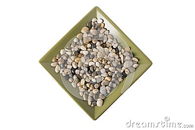 Decorative Pebbles on plate Stock Photo