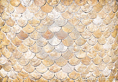 Decorative pieces of marble texture on concrete wall in many layer fish scale shaped patterns , horizontal background Stock Photo