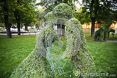 Decorative Plant park figures in the shape of a couple in love in the park. Vinnytsia, Ukraine. September 2020 Editorial Stock Photo