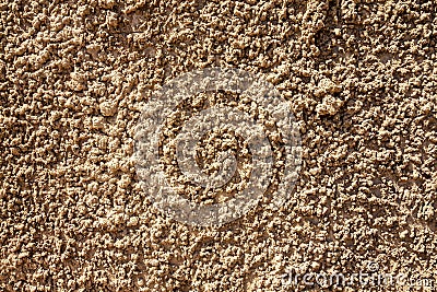 Decorative textured rugged plaster wall Stock Photo