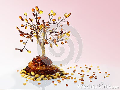 Decorative tree made withÂ yellow and brown baltic amber, amber beads and small pieces Stock Photo