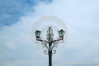 Decorative Vintage Streetlamp against Cloudy Sky Stock Photo