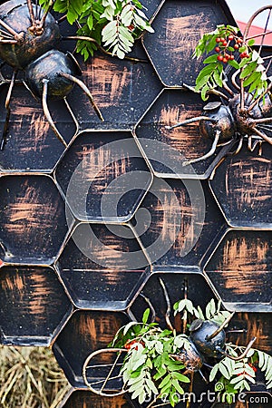 Decorative wall like a honeycomb. Agricultural Exhibition Stock Photo