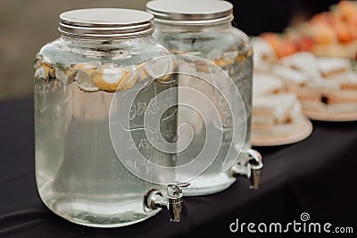 Decorative wedding outdoor party drink station with lemonade Editorial Stock Photo