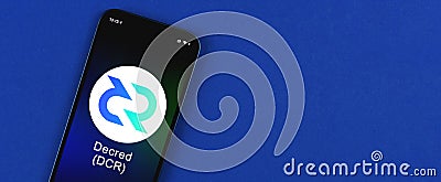 Decred DCR symbol. Trade with cryptocurrency, digital and virtual money, banking with mobile phone concept. Business Stock Photo