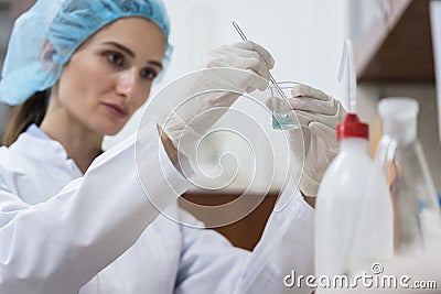 Dedicated chemist creating an innovative substance in the labora Stock Photo