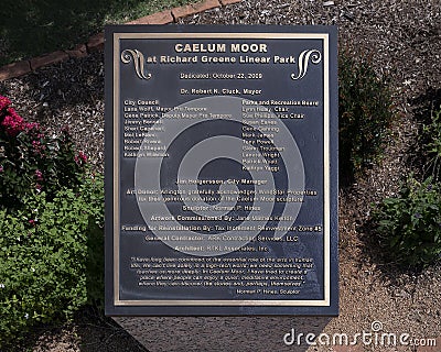 Dedication plaque for `Caelum Moor` at Richard Green Linear Park in Arlington, Texas. Editorial Stock Photo