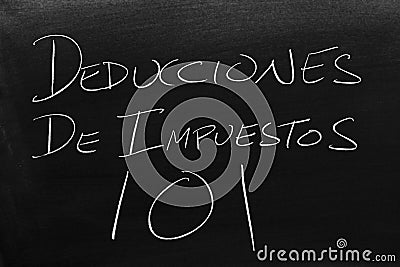 Deducciones De Impuestos 101 On A Blackboard. Translation: Tax Deductions 101 Stock Photo