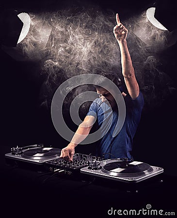 Deejay mixing at party Stock Photo