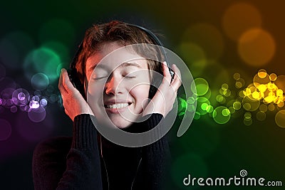 Deejay party girl with colorful bokeh Stock Photo