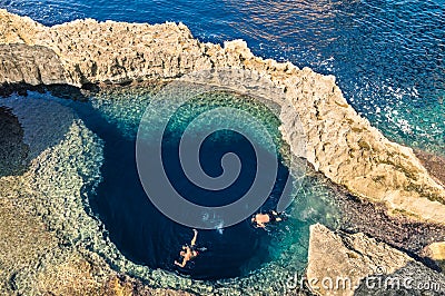 Deep blue hole at the world famous Azure Window in Gozo Malta Stock Photo