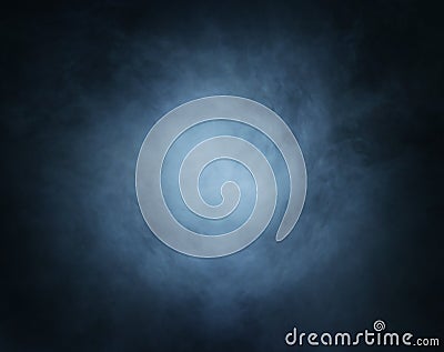 Deep cyan smoke background with light in center Stock Photo